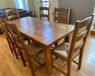 26. Crate and Barrel Rustic Dining Table w/ 1 Drawer (71" x 33" x 30") 2-20" leaves 6 Ladder Back Side Chairs w/ Rush Seat (18" x 17" x 42")