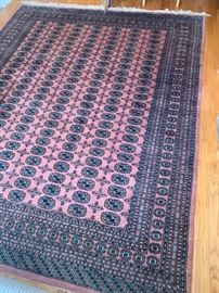 79. Rose Toned Hand Knotted Wool Rug (8' x 10')