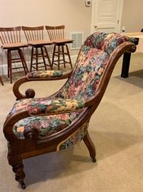 Antique Carved Accent Chair on Casters (28" x 33" x 37")c