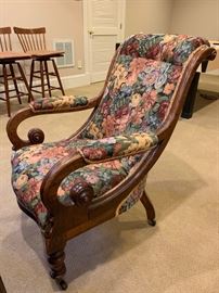 Antique Carved Accent Chair on Casters (28" x 33" x 37")