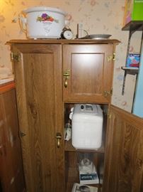 Small appliances still available. Cabinet has sold.