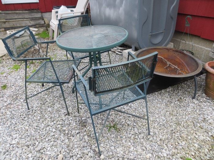 Small table and chair set, fire pit.