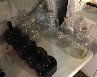 Vintage glass jugs with tops