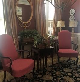 Pair of upholstered arm chairs, gilt wall mirror, lamps, nesting tables, more