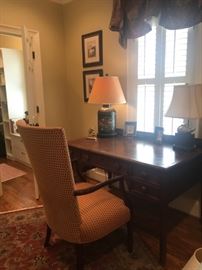Antique desk, lamps, rug, chair. prints