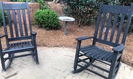 2 of 4 black wooden rockers