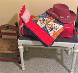 Small painted child's chair w/rush seat, Cowboy hat, Doll bed and quilt, vanity stool.