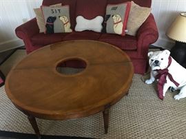Small red sofa, Resin UGA bulldog, Folding table
