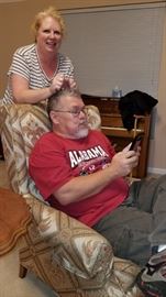 Laura and Glenn trying out the Ladies chair