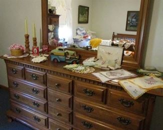Beautiful Maple Dresser loaded with vintage hand-made dresser sets,  Antique Child's Metal Cars,  frames, wall decor.... Several oil's etc.