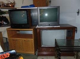Many generations of TV's.  A Sony projection TV is in back!