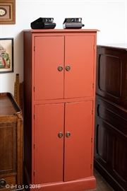Terracotta color wooden cabinet
