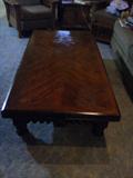 Huge wood Coffee Table...Few issues only on top...Easy fix to redo the top...Nice detail on bottom trim & legs