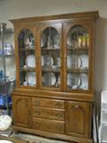 Large Ethan Allen Hard Rock Maple China Cabinet...Glass shelves and light inside...Holds lot of items and drawers for silverware also....