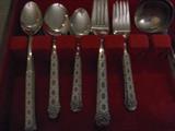 3 sets of silverware