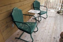green metal porch chairs