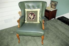 green vinyl wing chair
