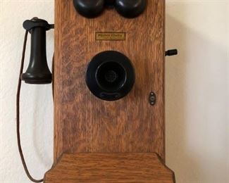 Antique early 1900s Western Electric Telephone in its oak case