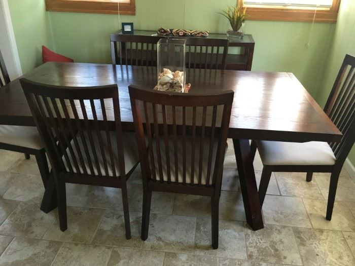 A beautiful dining table and chairs -- solid -- serious buyers only!