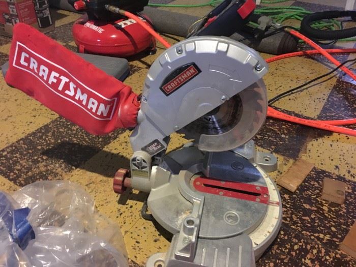 A nearly new Craftsman miter saw.