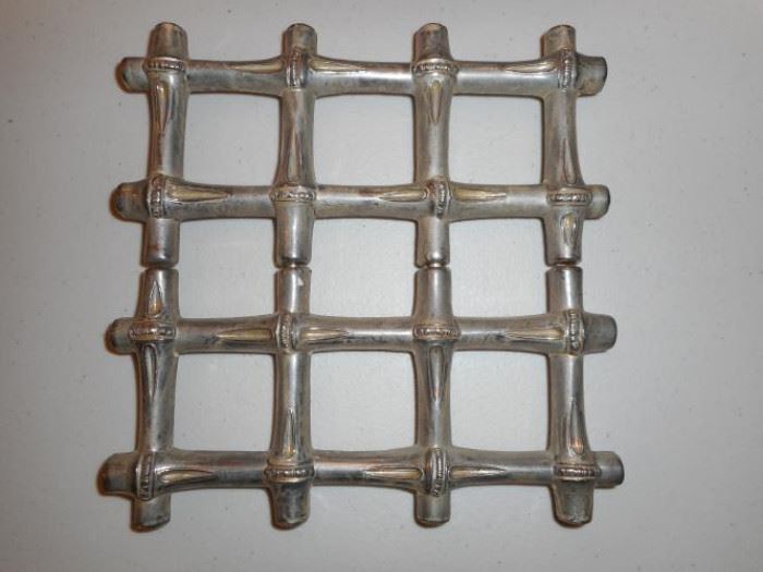 Vintage Expandable Nickel Trivet made in Italy https://ctbids.com/#!/description/share/132430