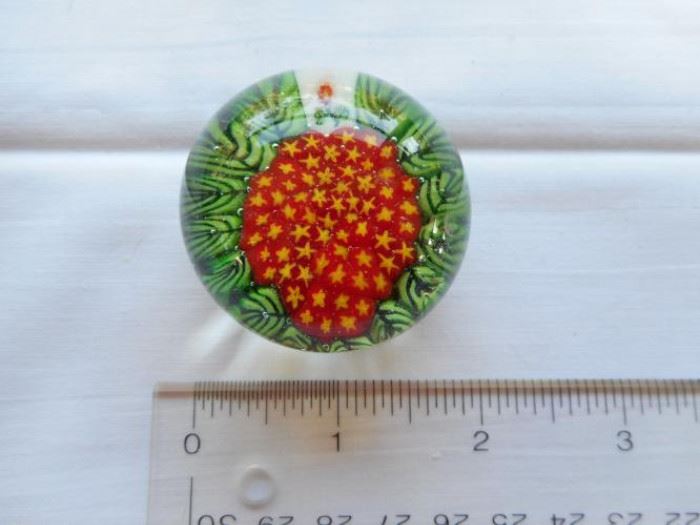 Vintage Pairpoint glass paperweight, red w/yellow stars, green edge 1 3/4" https://ctbids.com/#!/description/share/132653