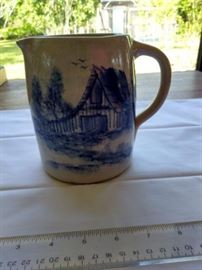 Vintage Paul Storie blue on cream pottery pitcher https://ctbids.com/#!/description/share/132512