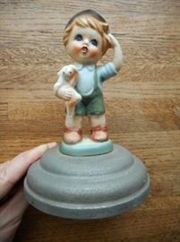 Vintage Hummel-look ? German rotating music boxhttps://ctbids.com/#!/description/share/132525