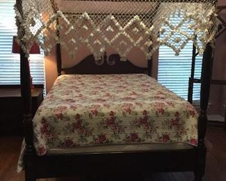 This full size canopy bed is wonderful