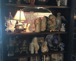 This collection is in the formal living room.  The most beautiful Madonnas, crosses, art work and ceramics