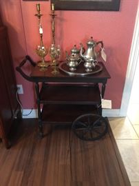 English Tea Cart, pewter coffee/tea set, glassware and brass candle sticks