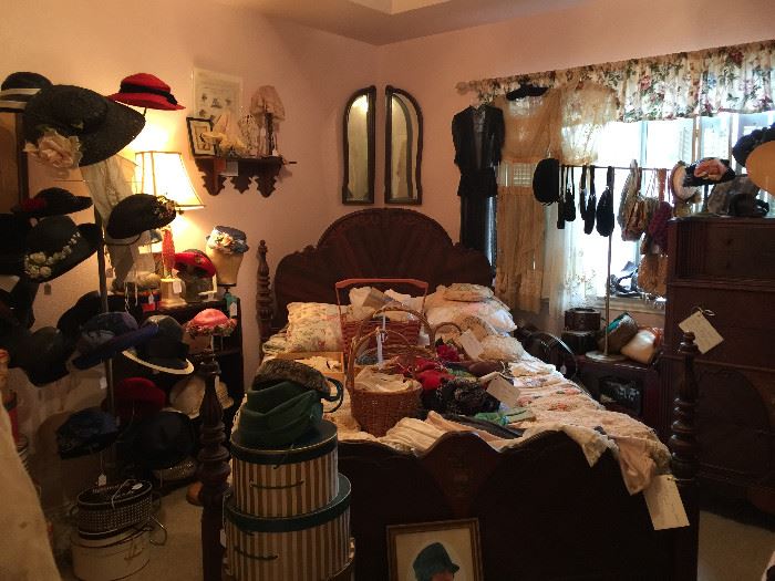 Upstairs in the Guest Room lots of vintage linens, lace, trim, hankies, scarves, hats, hat boxes, purses, mannequins and great furniture. 