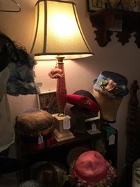 Vintage hats and a vintage lamp