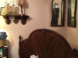 The headboard of the bed is beautiful