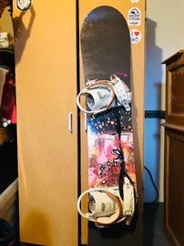 two snowboards with boots women 8 and mens 10.5