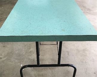 Nice long vintage folding table with pretty turquoise Formica top.