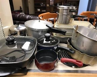 Lots of assorted kitchenware—pots, pans, gadgets, serve ware, bakeware and such.