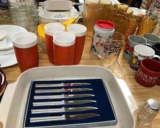 Lots of assorted kitchenware—pots, pans, gadgets, serve ware, bakeware and such.