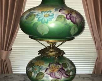 Gorgeous large vintage lamp with original matching hand painted base and shade.