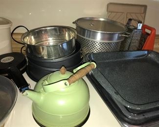 Lots of assorted kitchenware—pots, pans, gadgets, serve ware, bakeware and such.