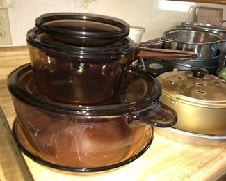 Lots of assorted kitchenware—pots, pans, gadgets, serve ware, bakeware and such.