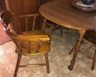 Vintage hard rock maple dining table with removable lazy Susan and 6 chairs.