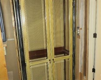 ETHAN ALLEN "EMPIRE" CURIO WITH ARCHED DOORS LIGHTED INTERIOR WITH GLASS SHELVING PAINTED IN GOLD WITH BLACK ACCENTS
