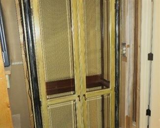 ETHAN ALLEN "EMPIRE" CURIO  WITH ARCHED DOORS   LIGHTED INTERIOR WITH GLASS SHELVING  PAINTED IN GOLD WITH  BLACK ACCENTS
