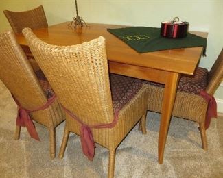 CHERRY FINISH DINING TABLE
ROOM & BOARD
RATTAN DINING CHAIRS (set of 4)
ROOM & BOARD
