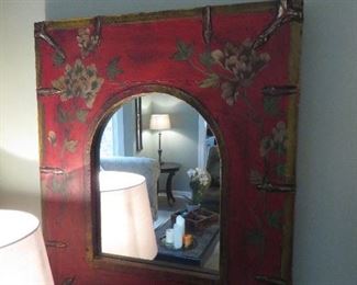RED FRAMED MIRROR WITH FLORAL DESIGN
