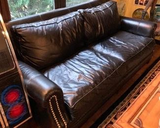 Fine leather sofa - matching chair and ottoman available.