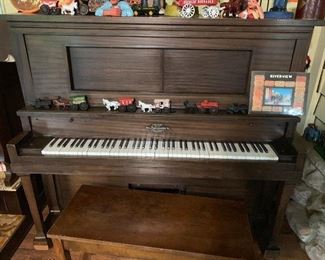 Player Piano with many additional rolls. Available for presale. Text offers to 847-772-0404.