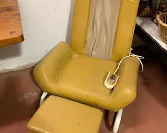 An early model massage chair.