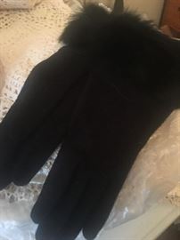 Lots of winter and dress gloves, scarves , etc